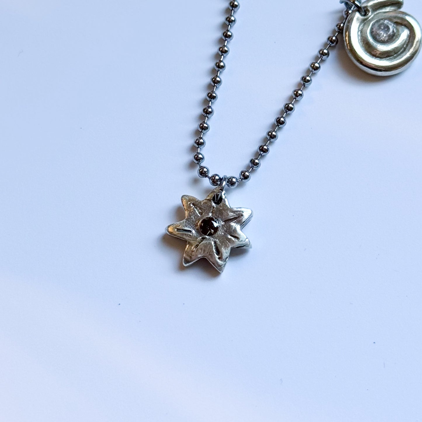 single sapphire starburst necklace